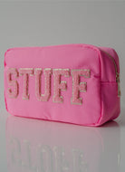 The STUFF Pouch Cosmetic Travel Bag in Bubblegum/Pink Angled View