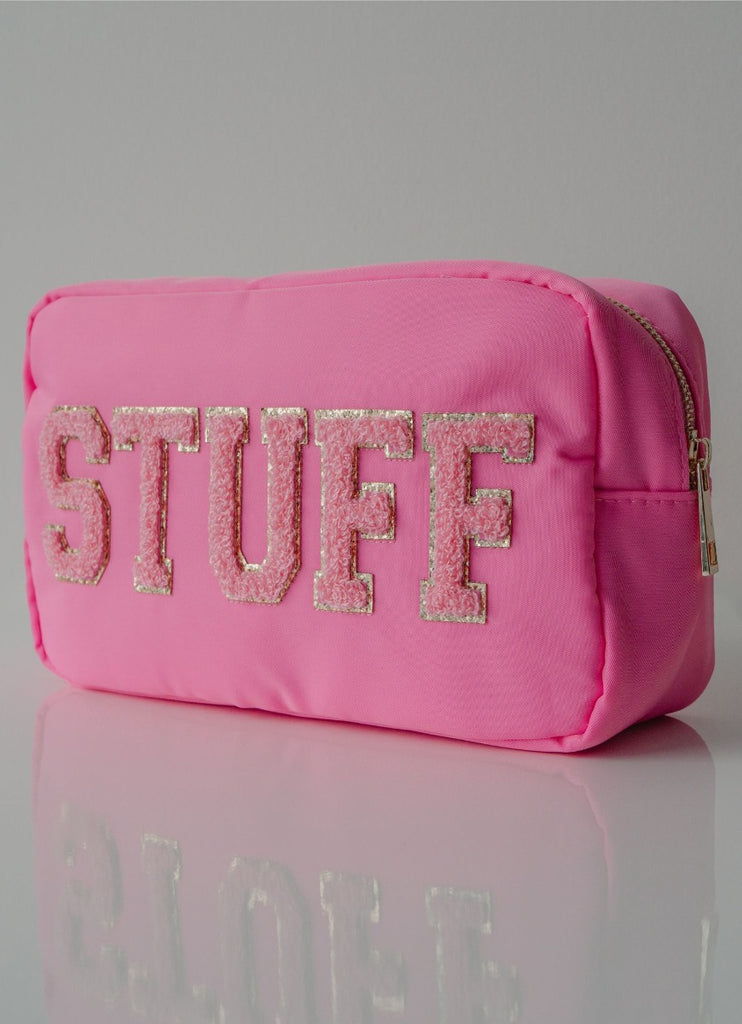The STUFF Pouch Cosmetic Travel Bag in Bubblegum/Pink Angled View