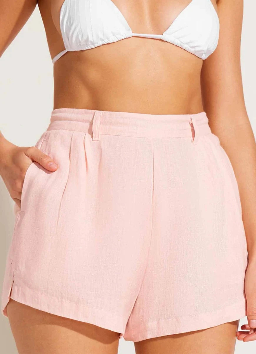 Vitamin A The Getaway Linen Shorts in Sunkissed Close Up Front View With Hand in Pocket
