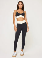 LSPACE Unmatched Sports Bra in Black/Cream Full Length Front View