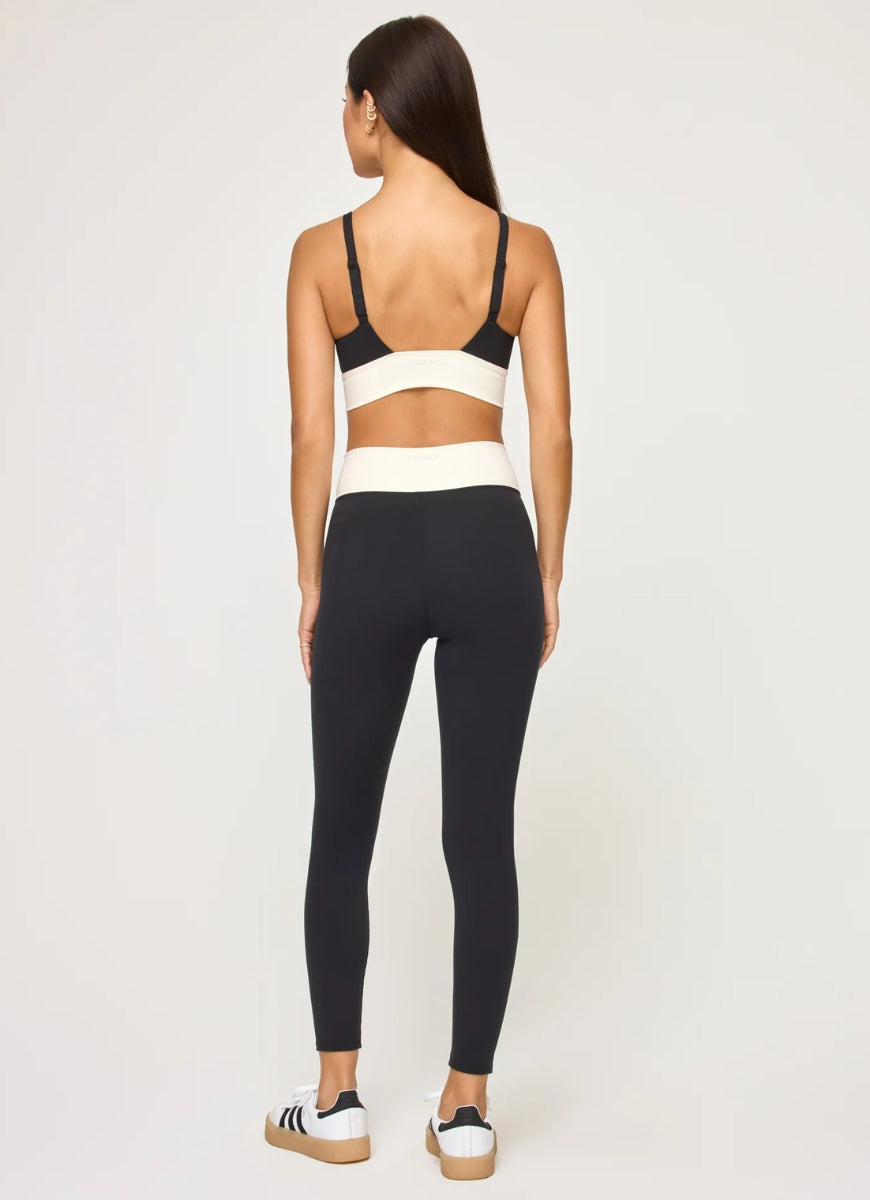 LSPACE Unmatched Sports Bra in Black/Cream Back View