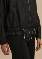 Varley Lotta Blousen Lightweight Jacket in Black Close Up View of Elastic Waist