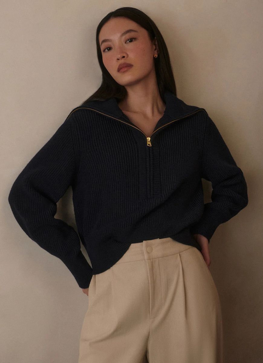 Varley Maura Half-Zip Rib Knit in Navy Front View Model With Her Hands on Her Hips
