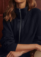 Varley Roxbury Zip-Through Sweatshirt Blue Nights Close Up View With Model Posing
