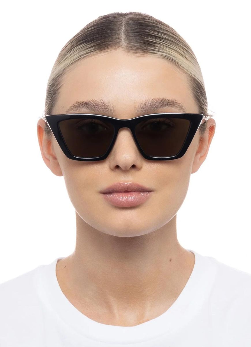 Le Specs Velodrome Women's Sunglasses in Black Shown on Model Front View