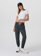 Vuori Performance Jogger in Charcoal Heather Full Length Front View