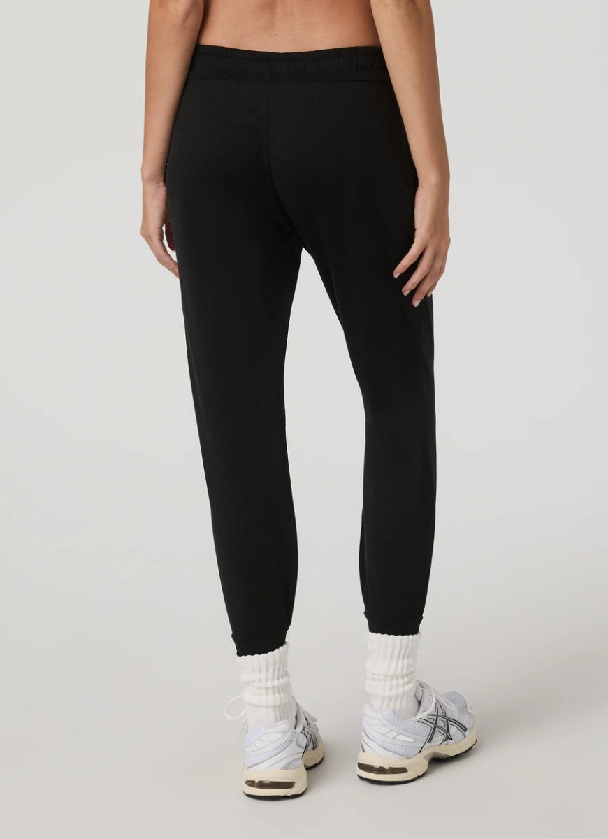 Vuori Women's Performance Jogger Long in Black Heather Back View