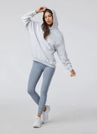 Vuori Restore Oversized Hoodie in Pale Grey Heather Front View With Hood Up