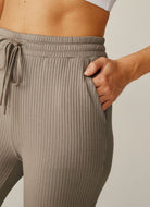 Beyond Yoga Well Traveled Wide Leg Pant in Birch Close Up View of Hand in Pocket
