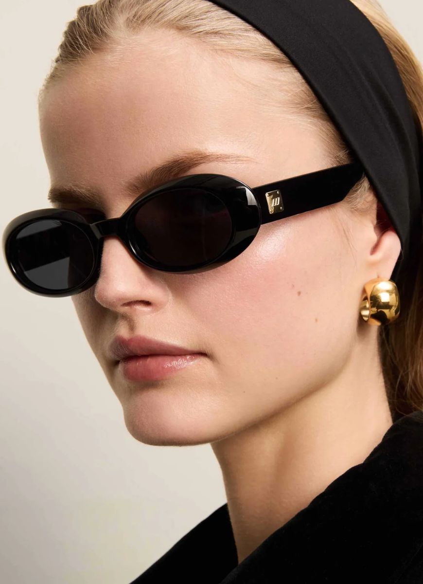 Le Specs Work It! Sunglasses in Black Shown on Model