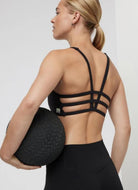 Vuori Yosemite Sports Bra in Black Close Up Back View