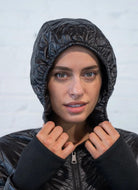 COZE Insulated Jumpsuit in Black Close Up View Showing Hood Up