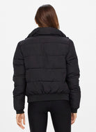 The Upside Nareli Insulated Women's Puffer Jacket in Black Back View