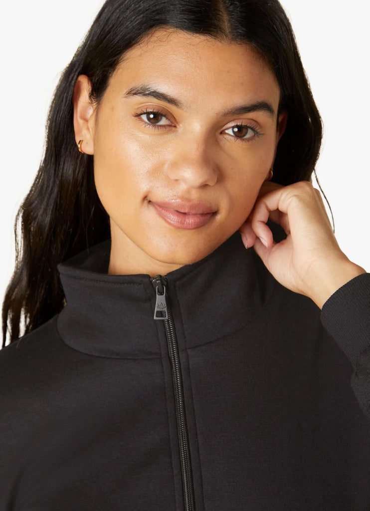 Beyond Yoga Women's Ski Weekend Jumpsuit in Black Close Up Front View Zipped Up