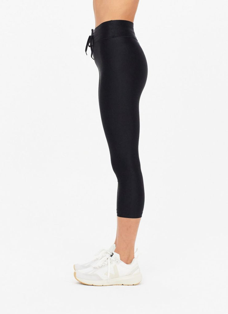 The Upside Original Super Soft NYC Women's Pant in Black Side View from the Waist Down