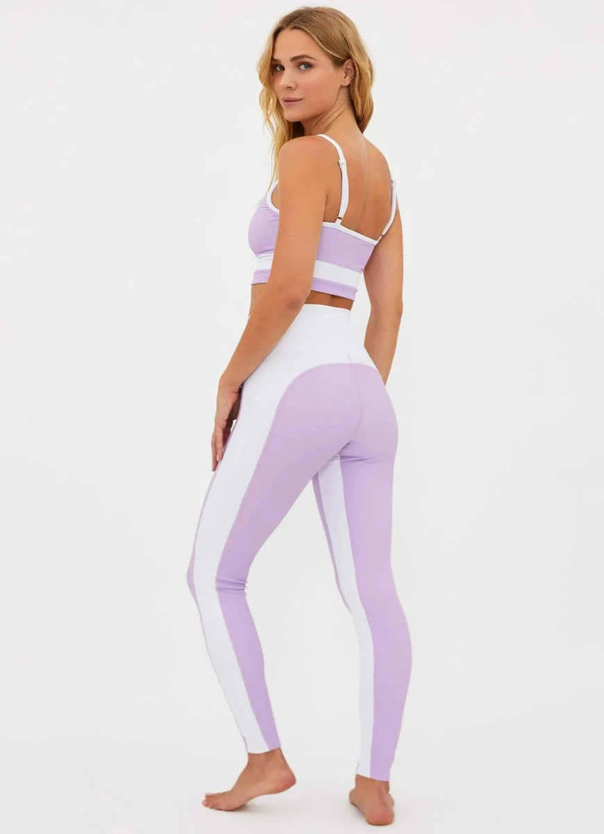 BEACH RIOT Colorblock Legging in Orchid Bloom Full Model Back View with Model Looking Over Shoulder