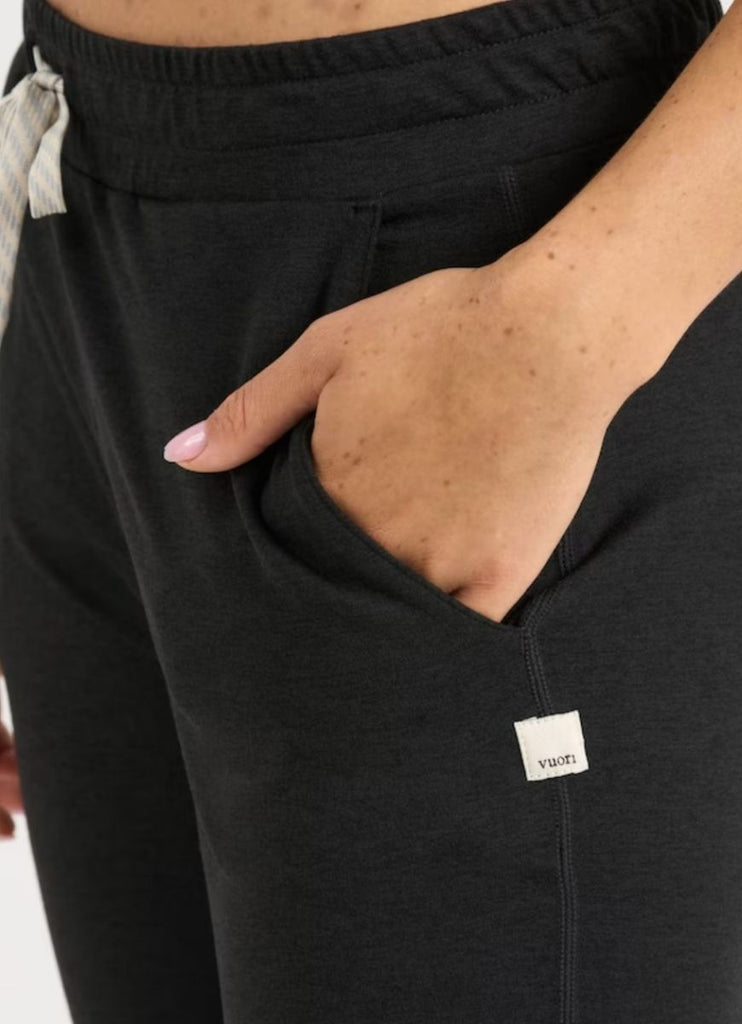 Vuori Women's Performance Jogger in Black Close Up of Hand in Pocket
